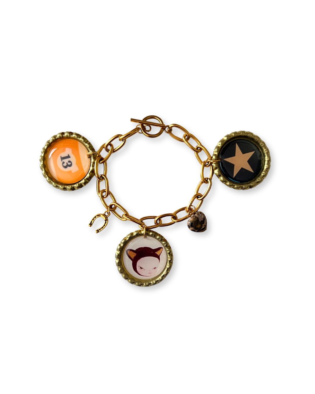 Bracelet with various charms on a white background