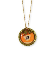 Necklace with a round pendant featuring the number 13 on a white background