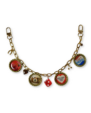 bag chain with vintage-style bottle cap charms on a white background