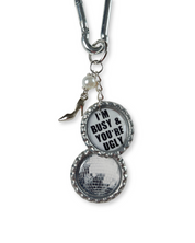 Keychain with disco ball and text charm on a white background