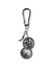 Keychain with 'I'm Busy & You're Ugly' quote and disco ball design on a white background
