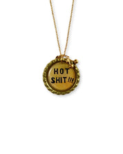 Necklace with a pendant displaying 'HOT SHIT!!!'