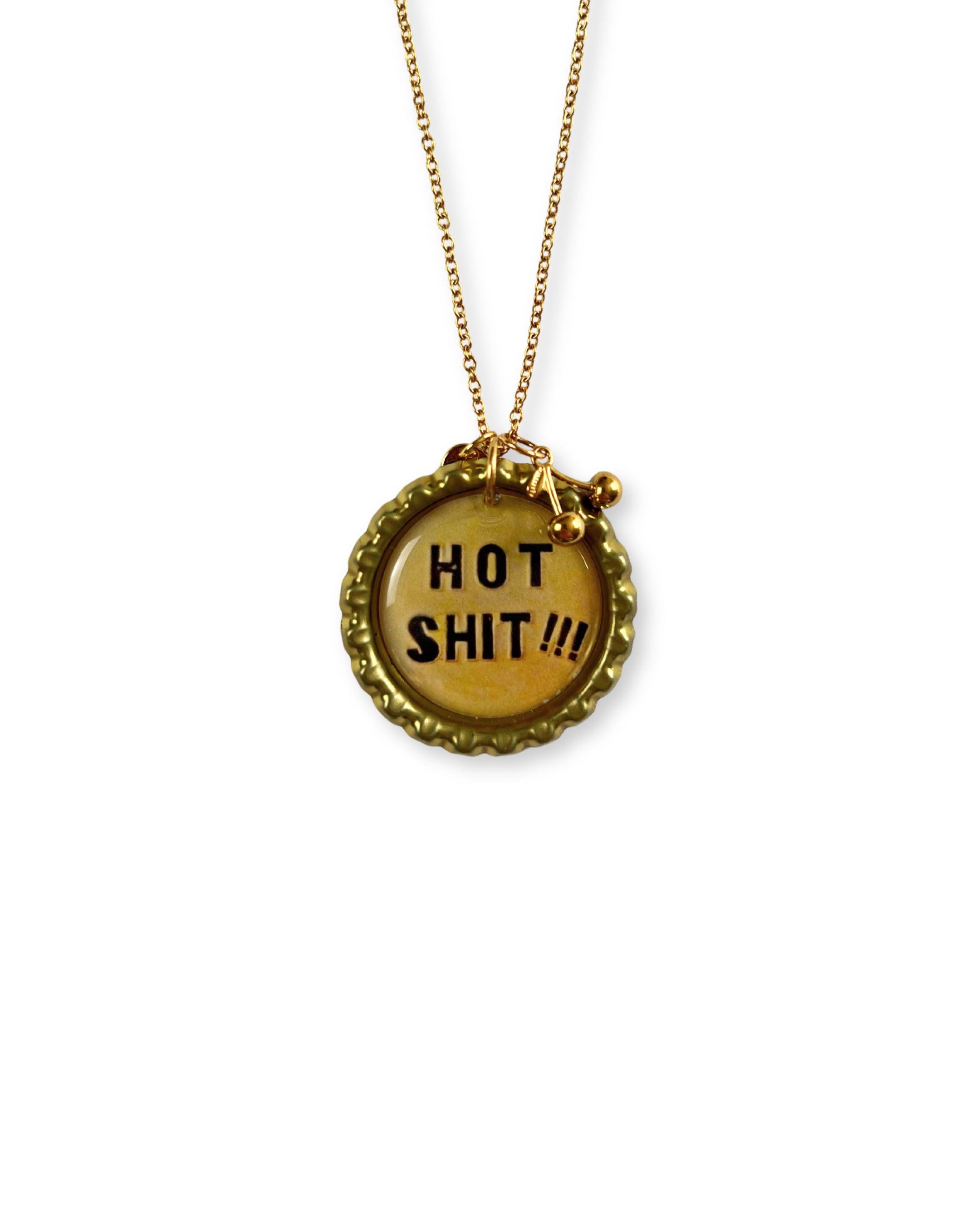 Necklace with a pendant displaying 'HOT SHIT!!!'