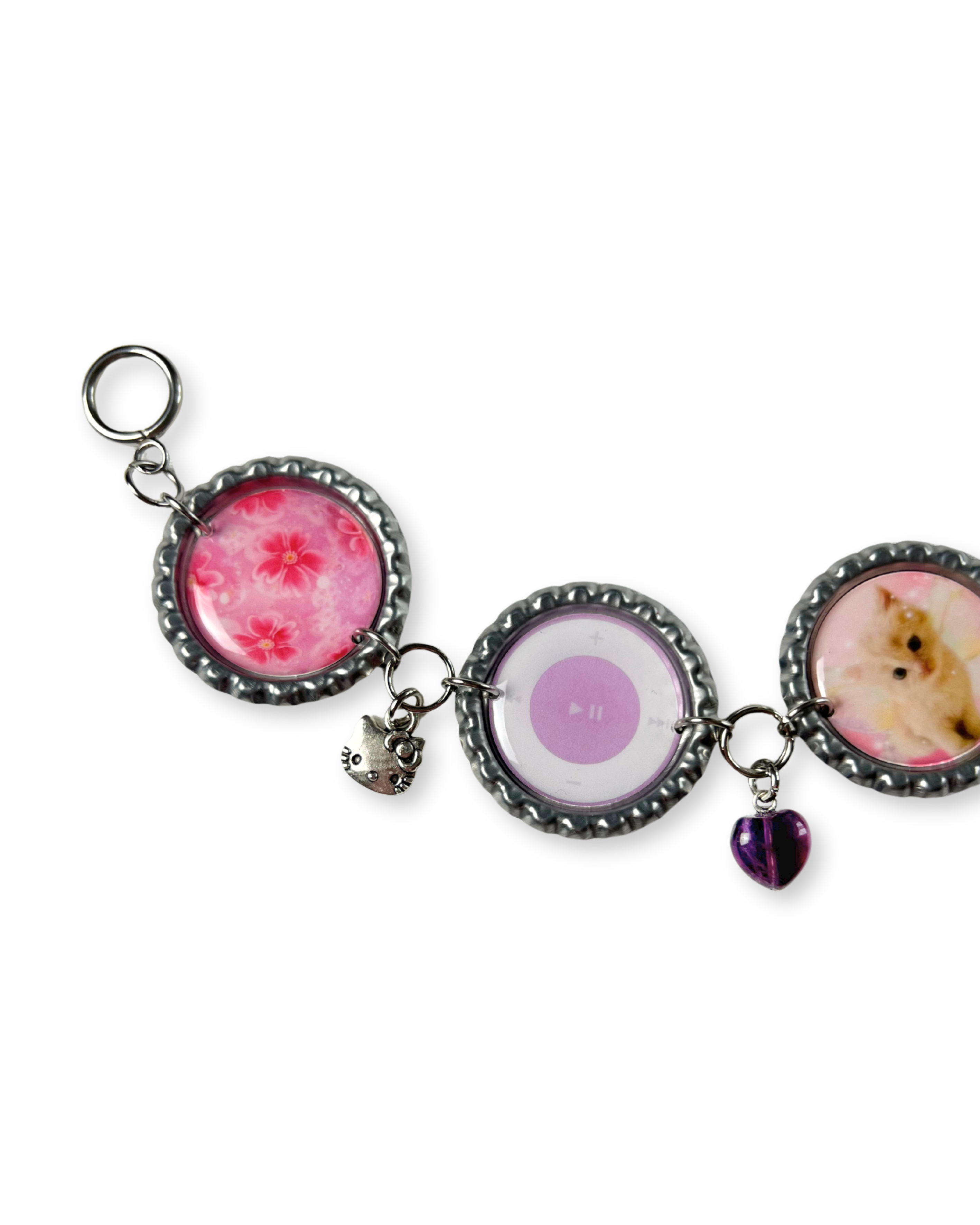 Keychain with circular charms featuring different designs on a white background