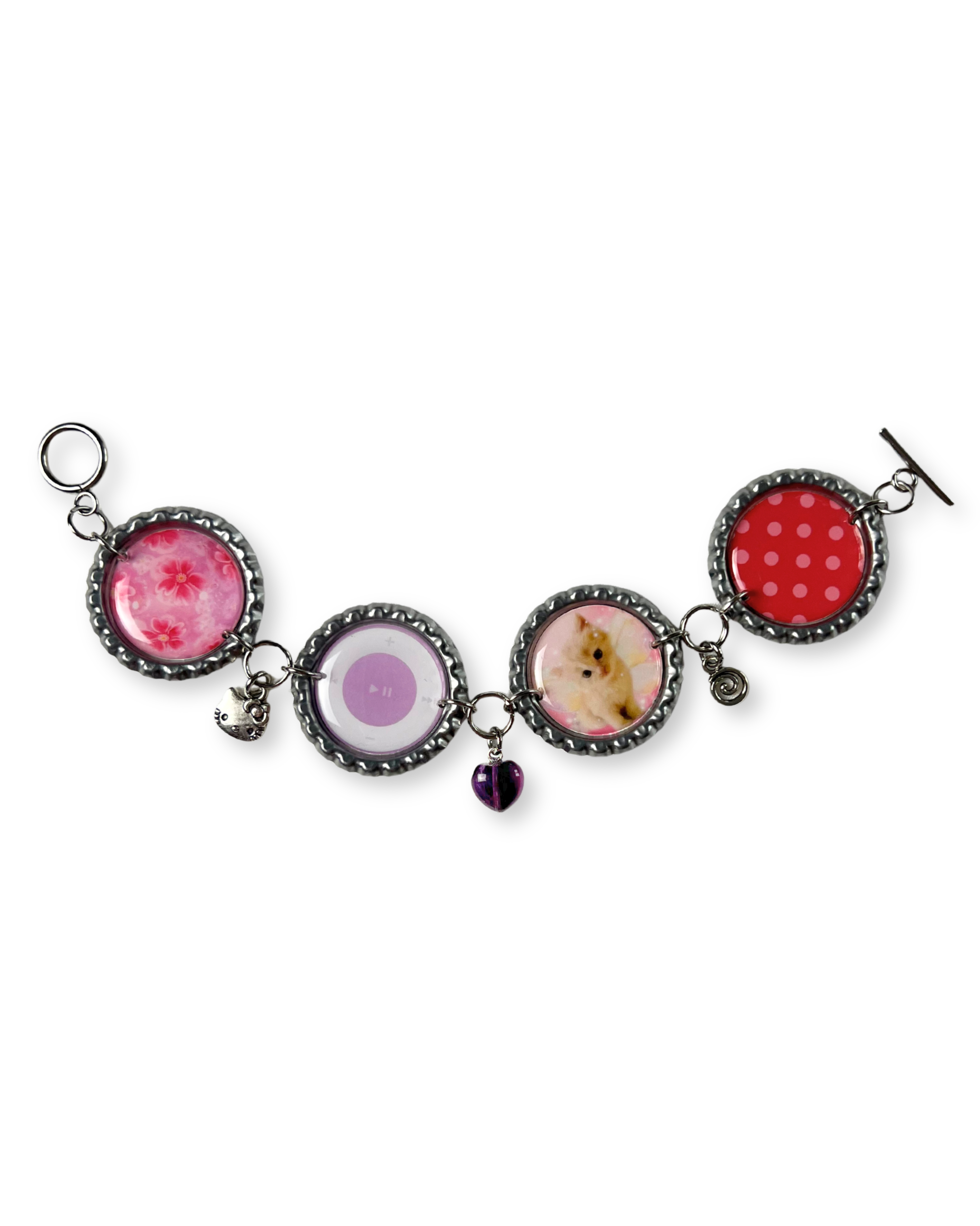 Bracelet with various charms on a white background
